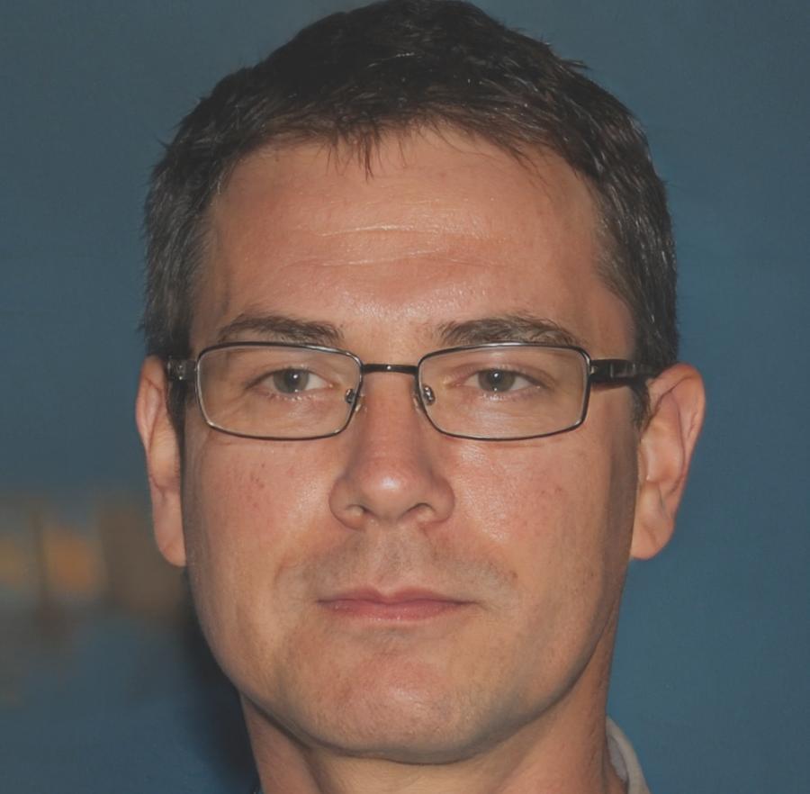 Georgi Ivanov, founder of NovaLink Pro, reviewing event budget documents